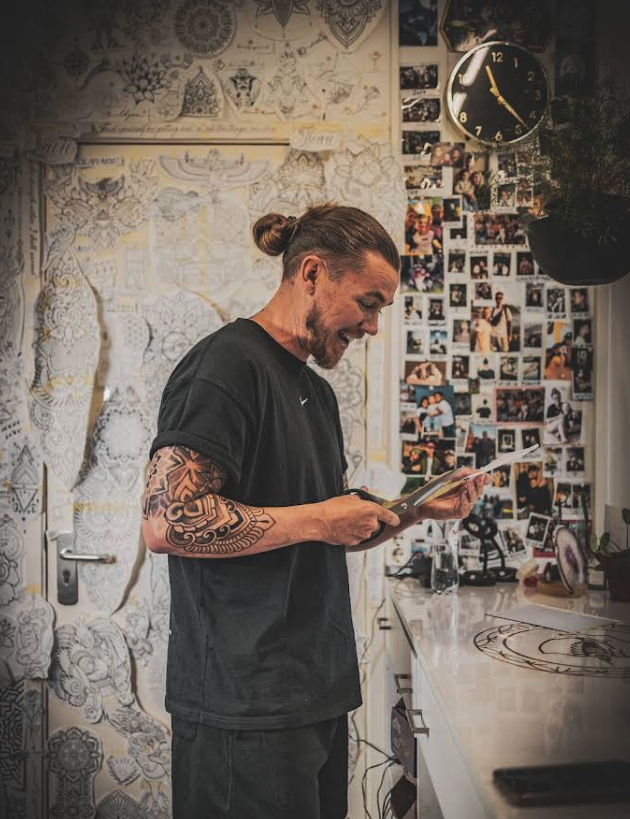 JB in his studio in front of his mandala flash wall